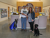 Rallyemaster presenting check to Canine Companions for Independence